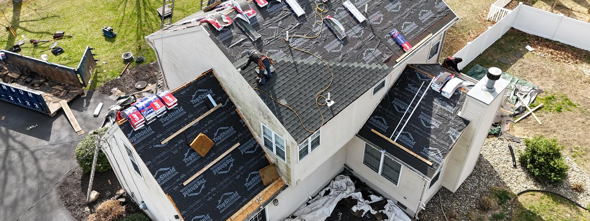 Aerial view of a completed JRG Builders roofing project